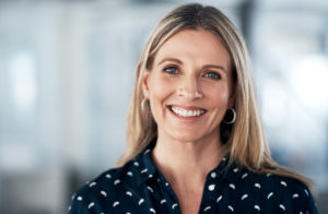 Blonde female smiling for neck lift
