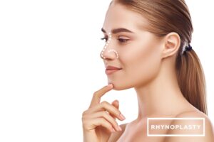 Rhinoplasty nose surgery Side view of attractive young woman with perfect skin and dotted lines on her nose isolated on white background Plastic surgery concept Nose deformations | emmett plastic surgery